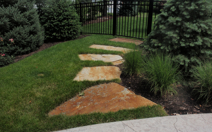 Patio project with refined paving layout and residential entry connection